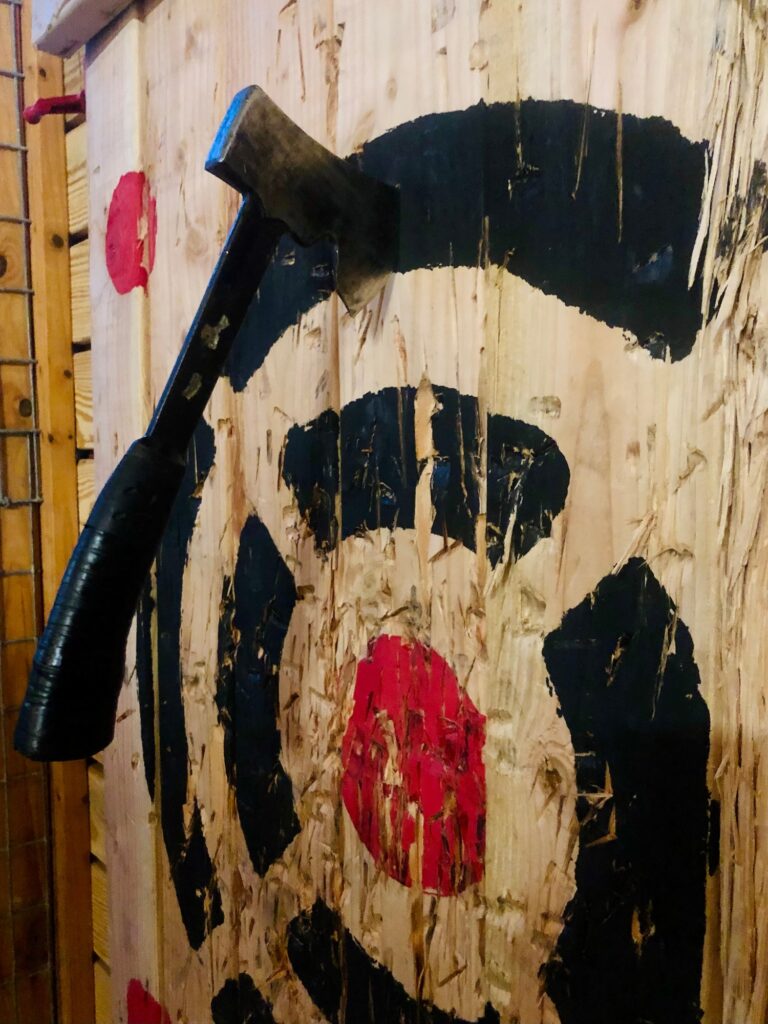 Hatchet in wooden target