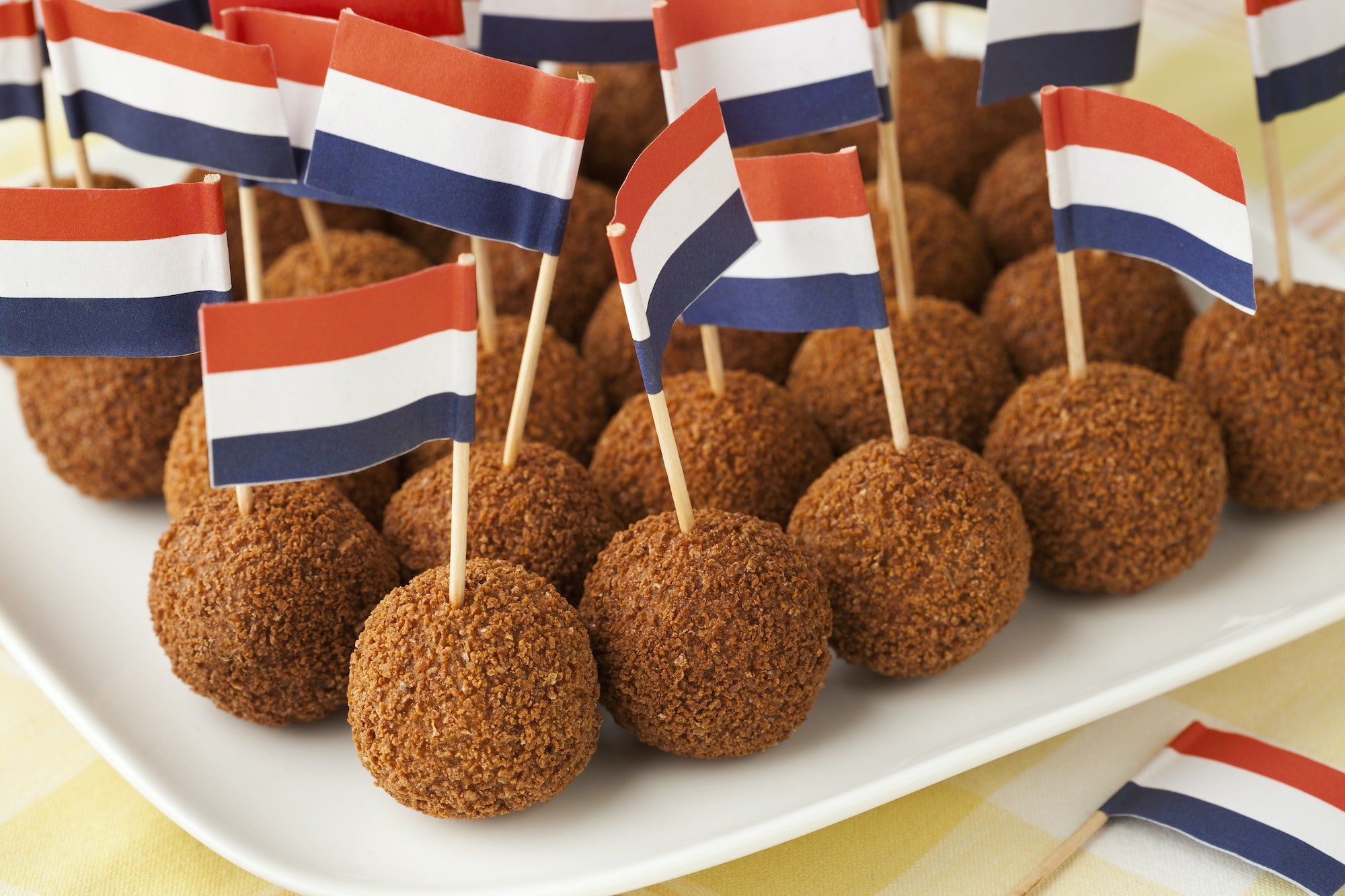 Dutch traditional snack bitterballen with a dutch flag